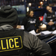 U.S. Immigration and Customs Enforcement (ICE) officers prepare for immigration raids in April 2018 in New York City.